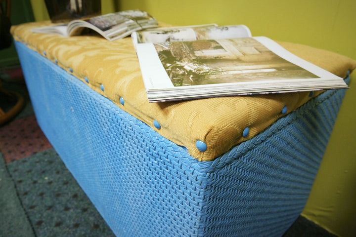 Blue wicker with yellow upholstered chest